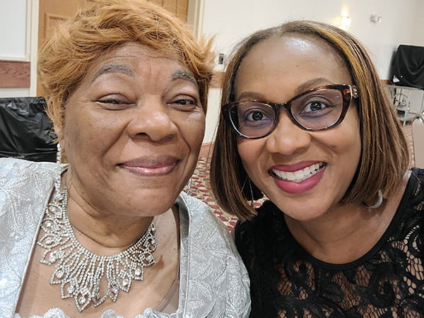 Felicia Veasey smiling with her mother